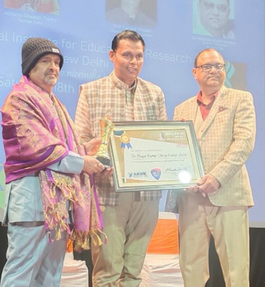 Dr. Mayur Joshi receiving award